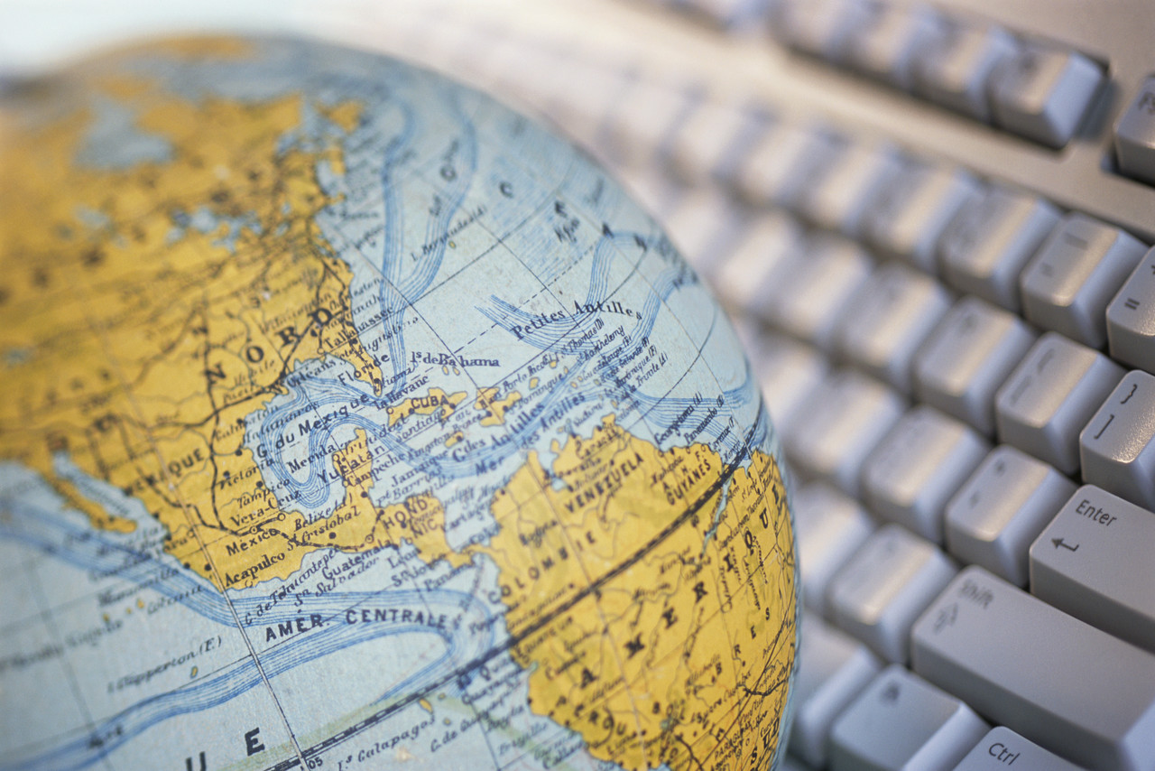 Globe Before Computer Keyboard Globe Before Computer Keyboard
